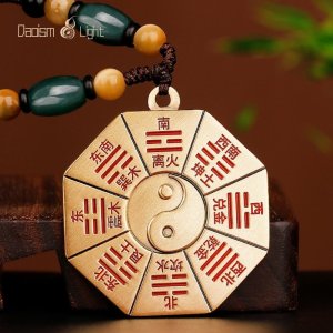 Double-sided Bagua pendant with Yin-Yang symbol and cinnabar detail