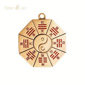Double-sided Bagua pendant with Yin-Yang symbol and cinnabar detail