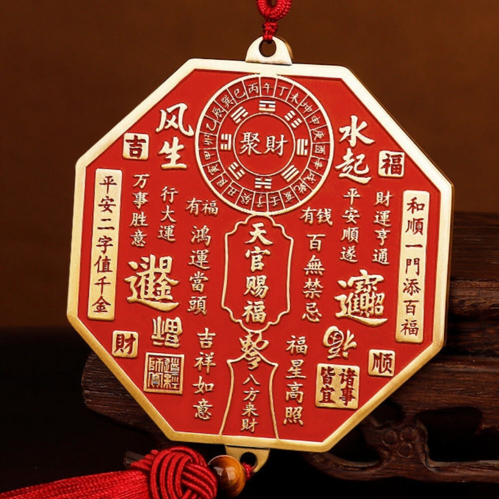 Close-up of octagonal brass Tian Guan plaque with genuine cinnabar filling