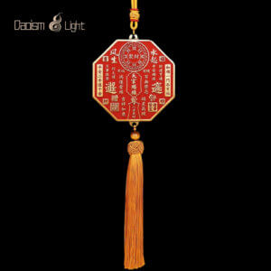 Octagonal Tian Guan Ci Fu brass plaque with gold tassel and cinnabar filling