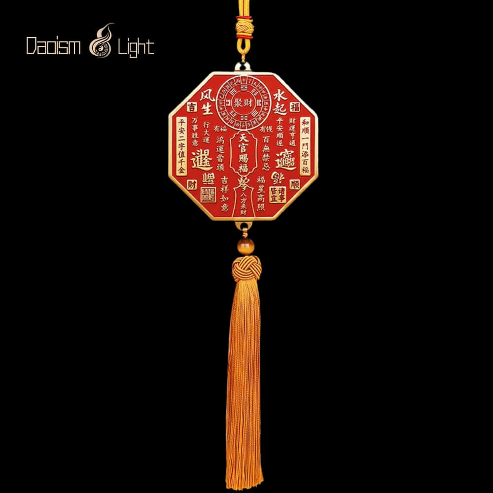 Octagonal Tian Guan Ci Fu brass plaque with gold tassel and cinnabar filling