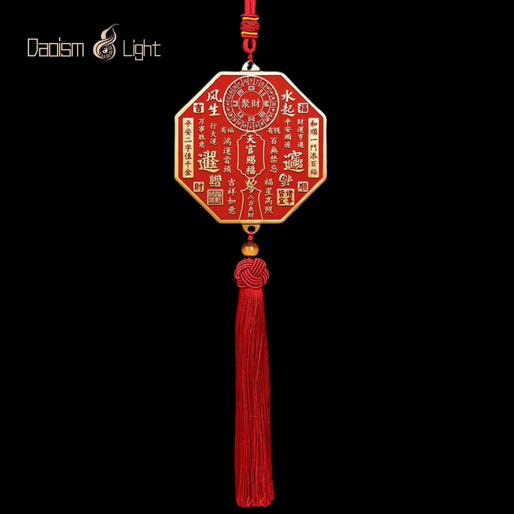 Octagonal Tian Guan brass plaque with red tassel and genuine cinnabar details