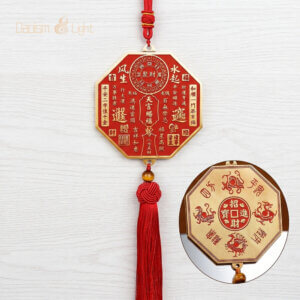 Octagonal Tian Guan brass plaque with red tassel and genuine cinnabar details