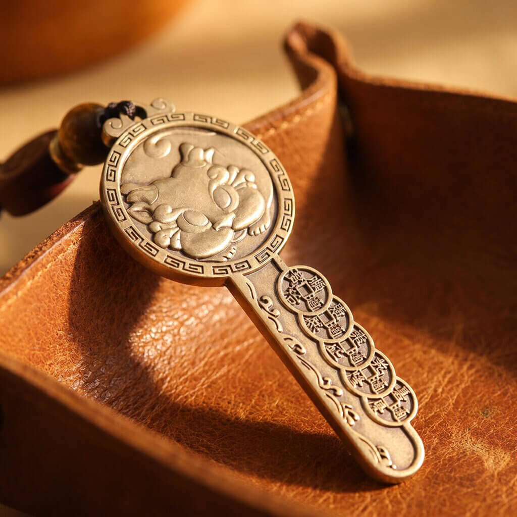 Chinese symbolic brass key charm by Daoism Light