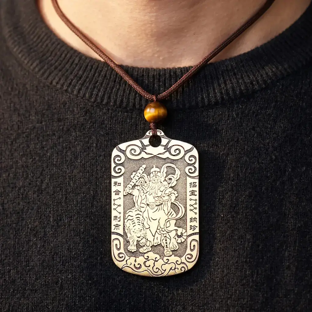Zhao Gongming tiger brass pendant necklace styled with casual clothing